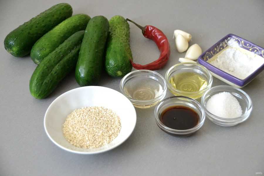 Салат из битых огурцов рецепт. салат из битых огурцов с кинзой. битые огурцы. фото